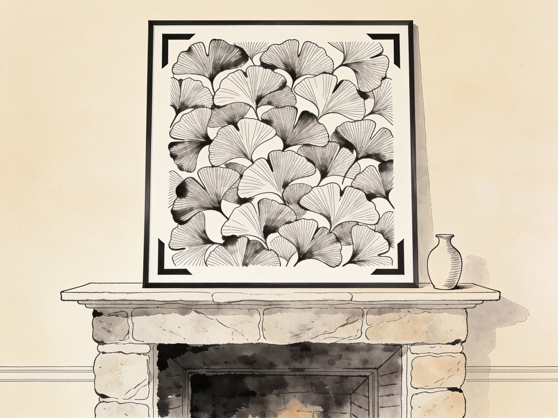 Affiche encadrée posée sur le manteau d'une cheminée en pierre, illustration ligne noire sur fond beige